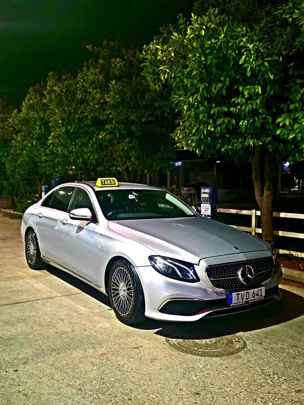 Mercedes taxi working at night in North Cyprus